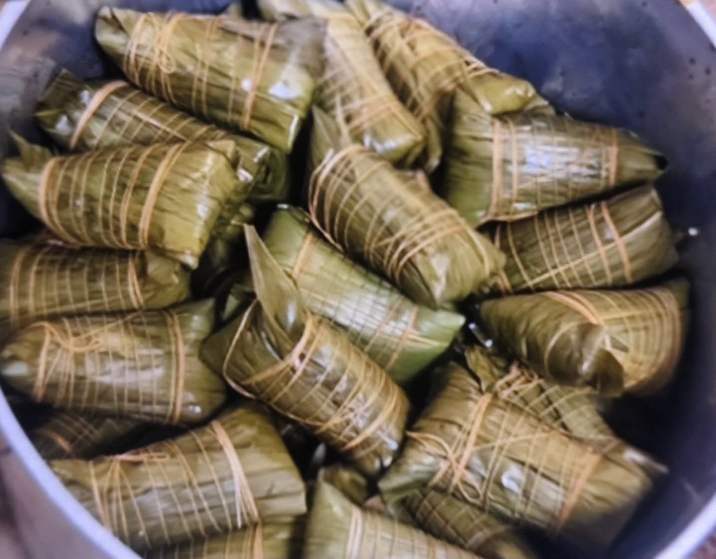 Traditional sticky rice dumplings wrapped in bamboo leaves